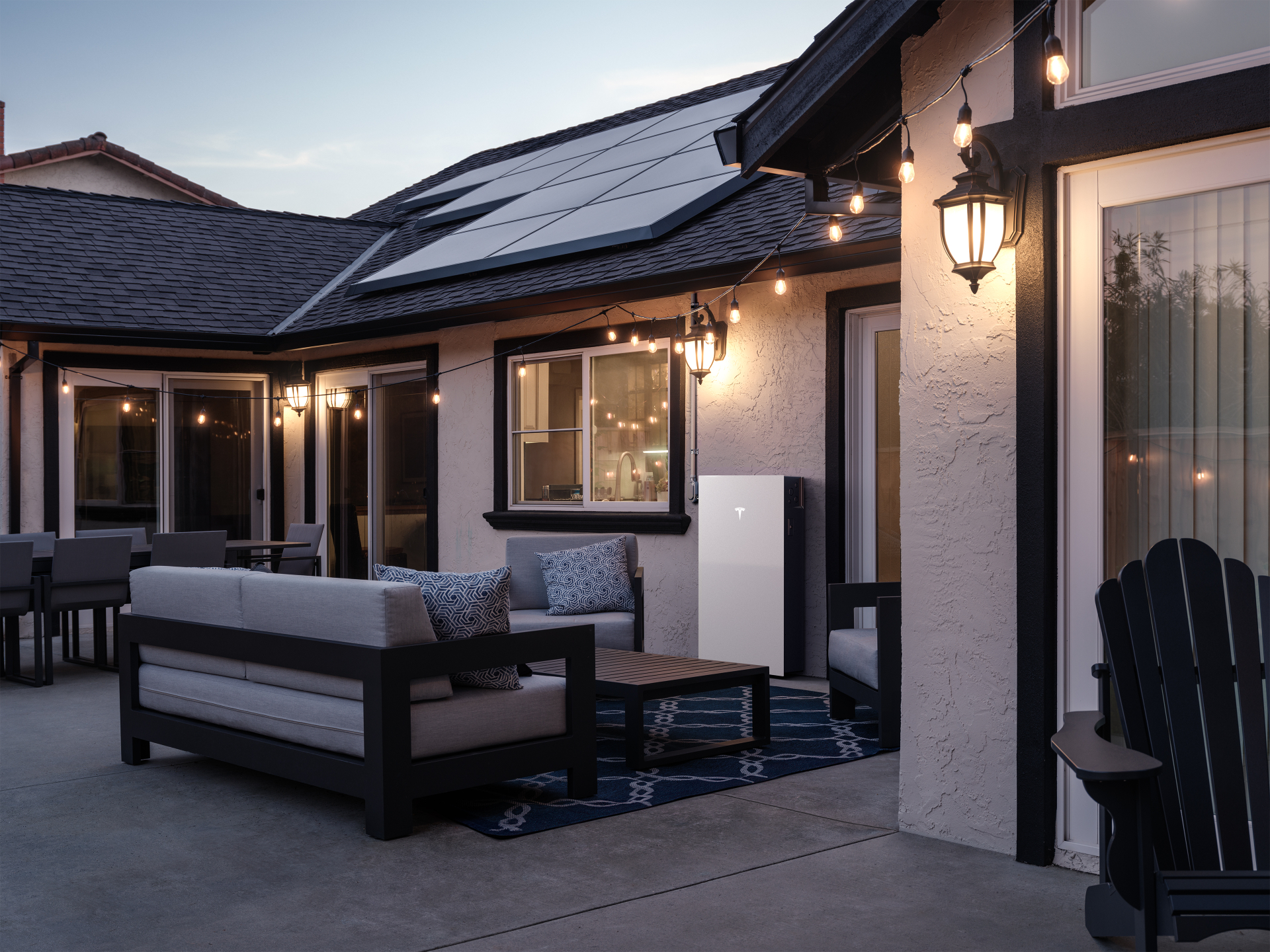 Tesla Powerwall on home patio