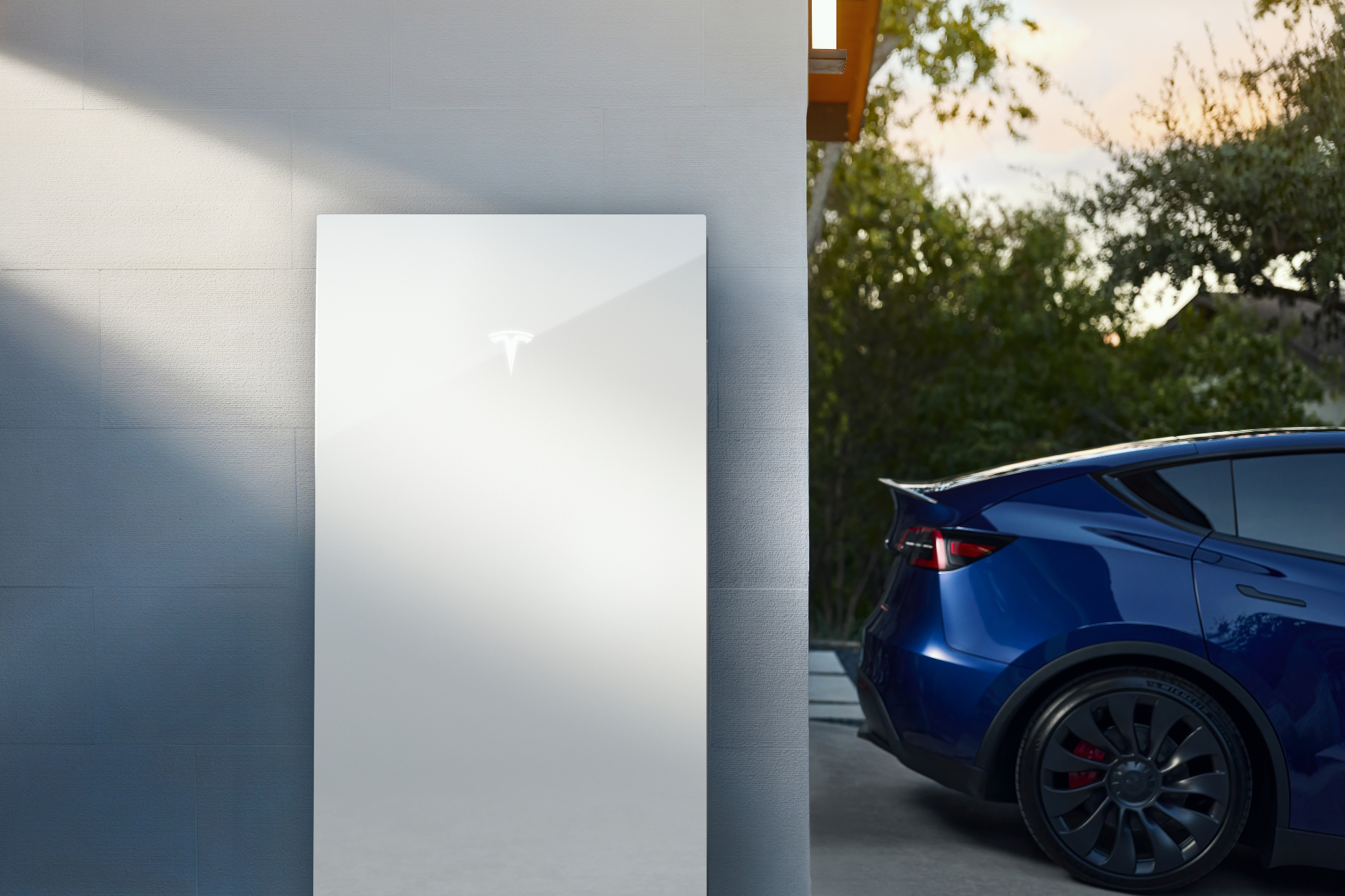 Tesla Powerwall 3 on home exterior at night